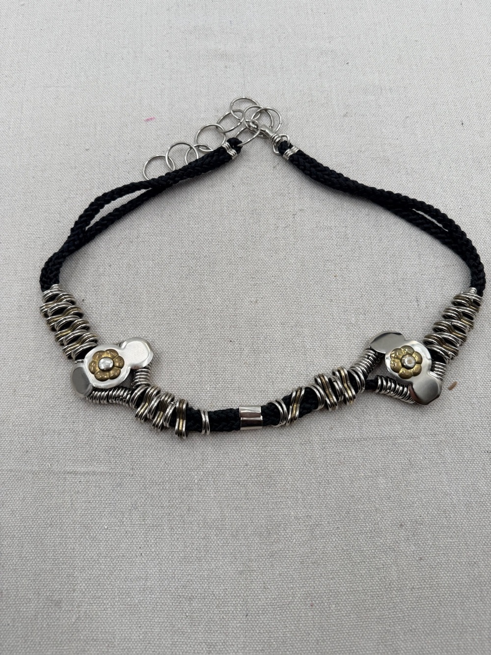 Handwoven Black Cord Belt with Silver Flower Accents